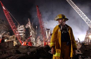 Bruce Stands In the Rubble of Ground Zero
